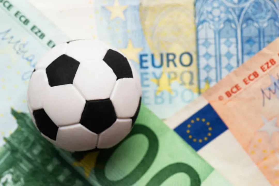 soccer ball with money in background